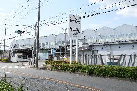 Nissan Motor Company exterior, logo, and signboard